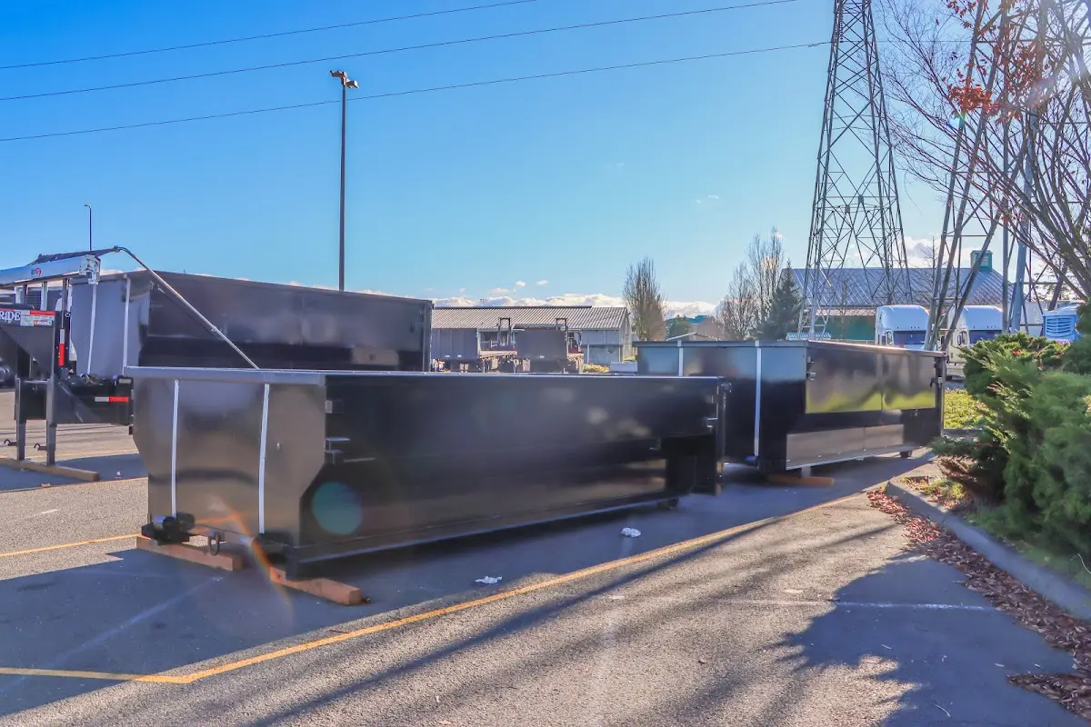 Roll-off dumpster ready for waste disposal at job site for 2 Yard Dumpster Rental in West Earl